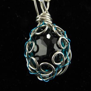 Wire Wrapped Synthetic Tourmaline 28.90 ct